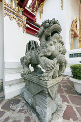 Fototapeta na wymiar Lion at front of temple in Thailand
