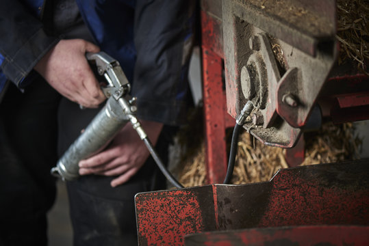 Farmer Repair His Agricultural Machine