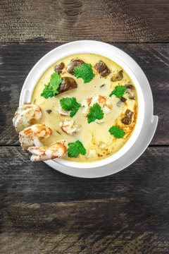 Tom Yam, traditional Thai soup with shrimps and mushrooms