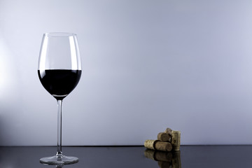 red wine glass on black and white