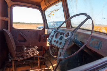 Abandoned rusty truck interior in outback Queensland