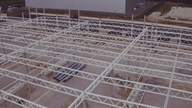 Aerial footage of building new large warehouse