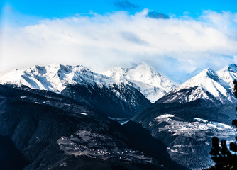 Fototapeta na wymiar Mountain landscape with snow and villages