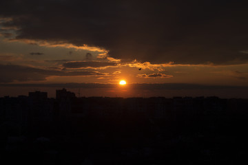 Sunset sky and cloud with siluate city scape