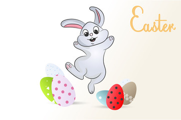 happy Easter. funny Bunny jumping over the painted eggs.
