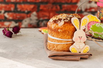 Easter orthodox sweet bread, cottage cheese kulich and colorful bunny and eggs cookies.