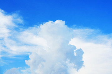 Naklejka na ściany i meble Cloud shape like people on blue sky