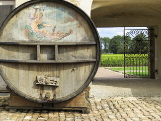 Chateau de Pommard, Pommard, Burgundy, France. The court of the castle with two big wine barrels.