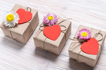 Valentine day three gift boxes on wooden background