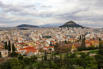 Fototapeta na wymiar Greece, Athens city partial view with Lycabettus hill in the background.