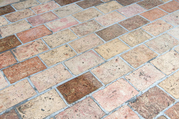 Vintage stone street road pavement texture, outdoor.