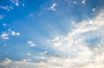 dramatic sky with sun rays, sunlight through the clouds.