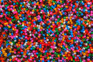 Fototapeta na wymiar Many rainbow beads as background