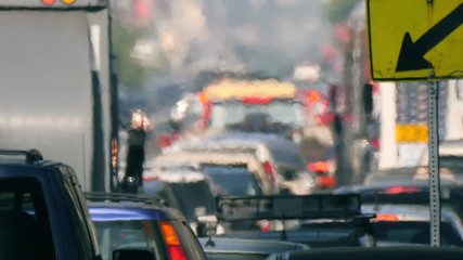 City street crowded cars in traffic jam hot day air turbulence Los Angeles