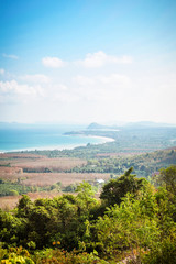 Viewpoint on Chumphon coastline from Buddha gold statue at Wat Khao Chedi-Phra Yai temple located on top of hill, Pathio, Chumphon district, Thailand