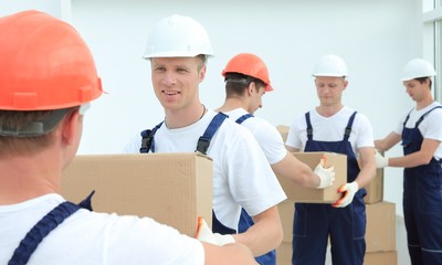team of builders to unload materials