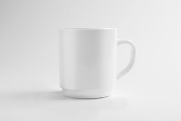 Ceramic cup on white background. Mockup for design