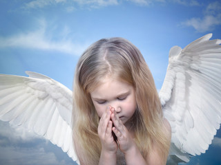 Little girl angel with wings