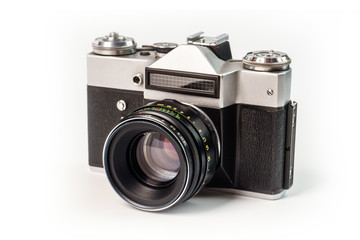 Retro film photo camera isolated on white background. Old analog