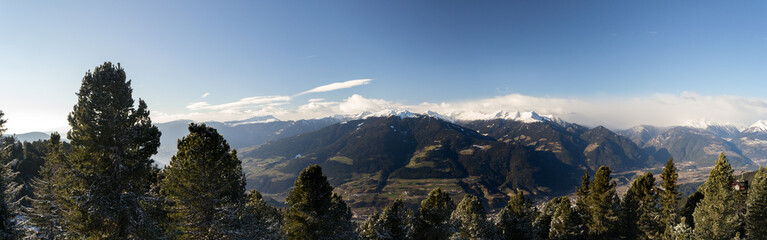 Very large horizontal mountain valley panorama in Italy