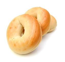 Plain bagels on white background