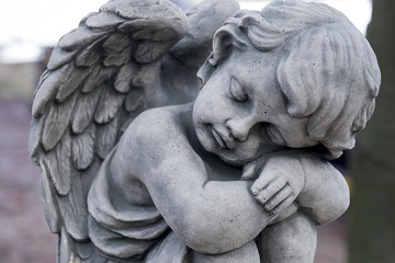 grave statue in the winter day