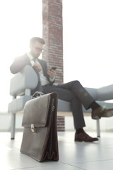 Businessman sitting on sofa in the office