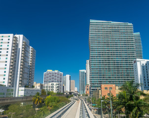 Fototapeta na wymiar Miami downtown city metro bus road and buildings on a sunny winter day