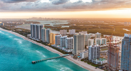 Miami Beach buildings at dusk, aerial view from helicopter