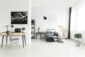 Fototapeta premium Teenager's bedroom with black map