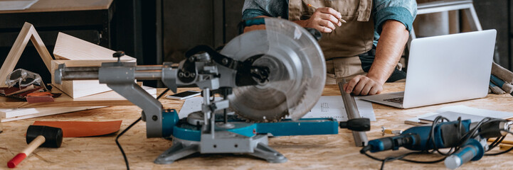 Carpenter doing calculations