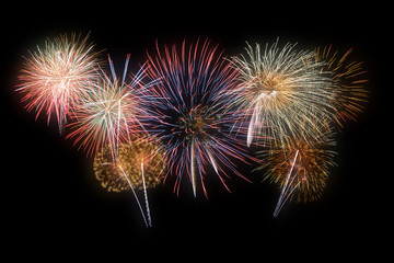 Colorful firework on the night sky. New Year celebration fireworks. Abstract firework isolated on black background with free space for text