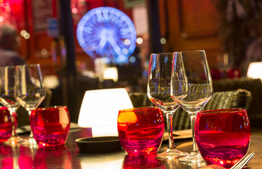 table decoration with wine and coloreful water glasses