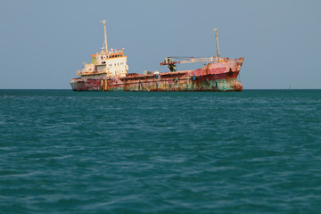 Waterlogged vessel in sea. Grenada