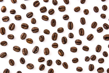 Coffee beans pattern isolated on white background. Top view

