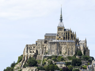 Fototapeta na wymiar Mont St. Michel, Normandy, France. Le Mont Saint-Michel is an island, the seat of the monastery from which it draws its name.