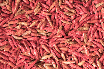 Red chilli / View of dry red chilli in wooden container. Top view.
