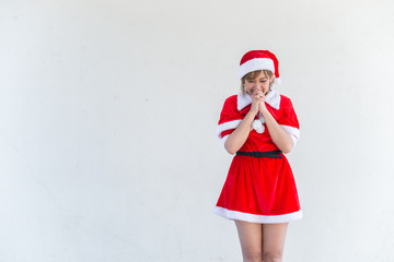 Beautiful young asian woman in Santa Claus clothes on white background,Thailand people,Sent happiness for children,Merry christmas,Welcome to winter,Happy woman concept