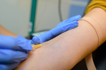 Needle being inserted into vein