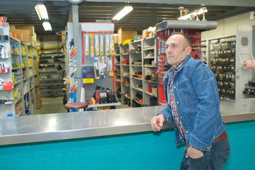 a hardware store client at the counter
