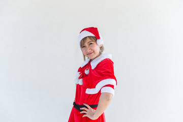 Obraz premium Beautiful young asian woman in Santa Claus clothes on white background,Thailand people,Sent happiness for children,Merry christmas,Welcome to winter,Happy woman concept