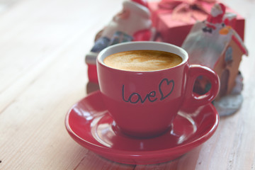 Coffee cup with gift for christmas.