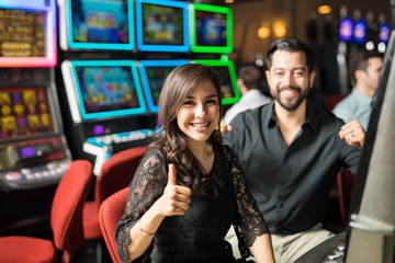 Cute couple winning in a casino
