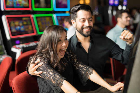 Excited couple hitting the jackpot