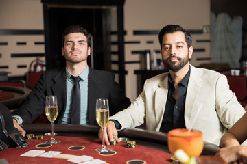 Confident card players in a casino