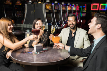 Friends celebrating in a casino
