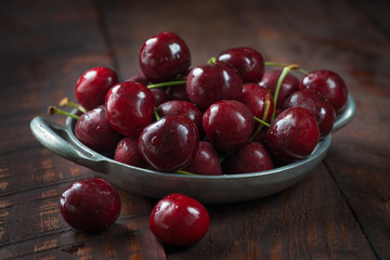 cherry cherries bowl metal wood red fruit dark ripe
