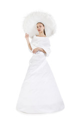 Girl in white long dress and big hat.