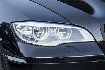 headlight of prestigious car close up