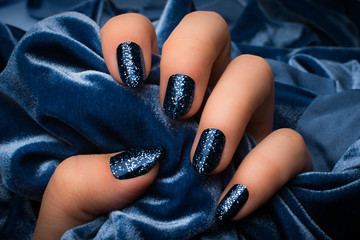 blue glittered nails
